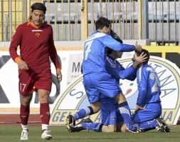 Empoli forward Pozzi is congratulated by team mates for his goal during their Italian Serie A match in Empoli